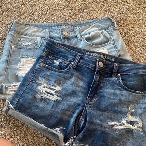 Two pairs of mid size stretchy American Eagle jean shorts!